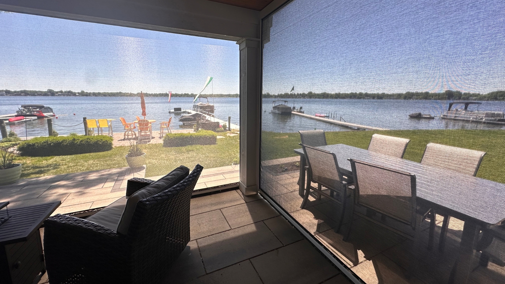 Retractable awning providing shade over outdoor furniture